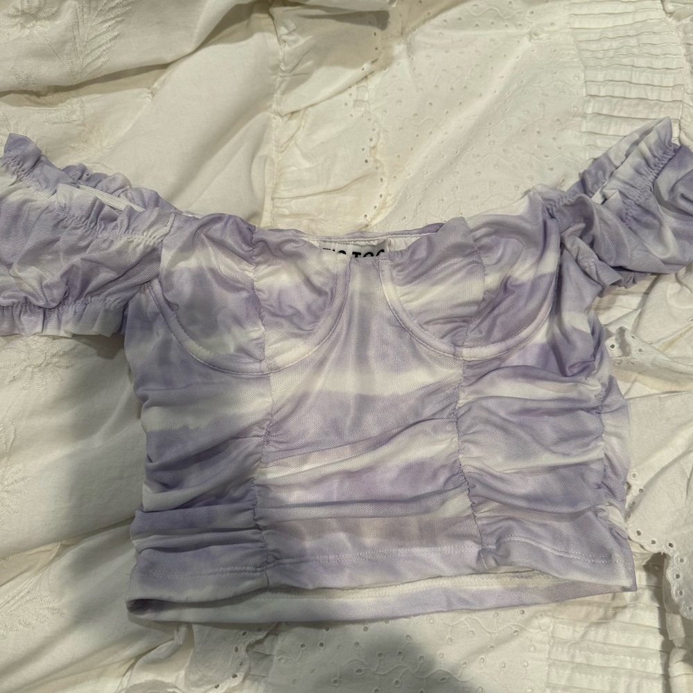 Purple and white top